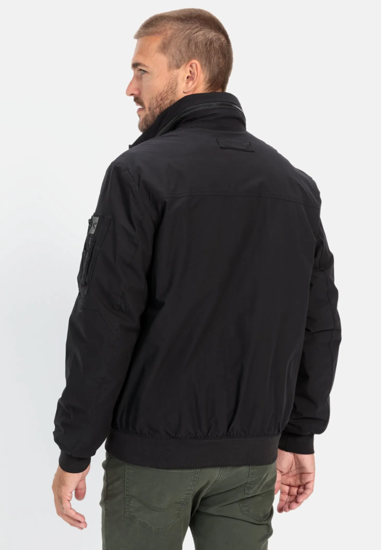 Softshell Blouson mit einrollbarer Kapuze