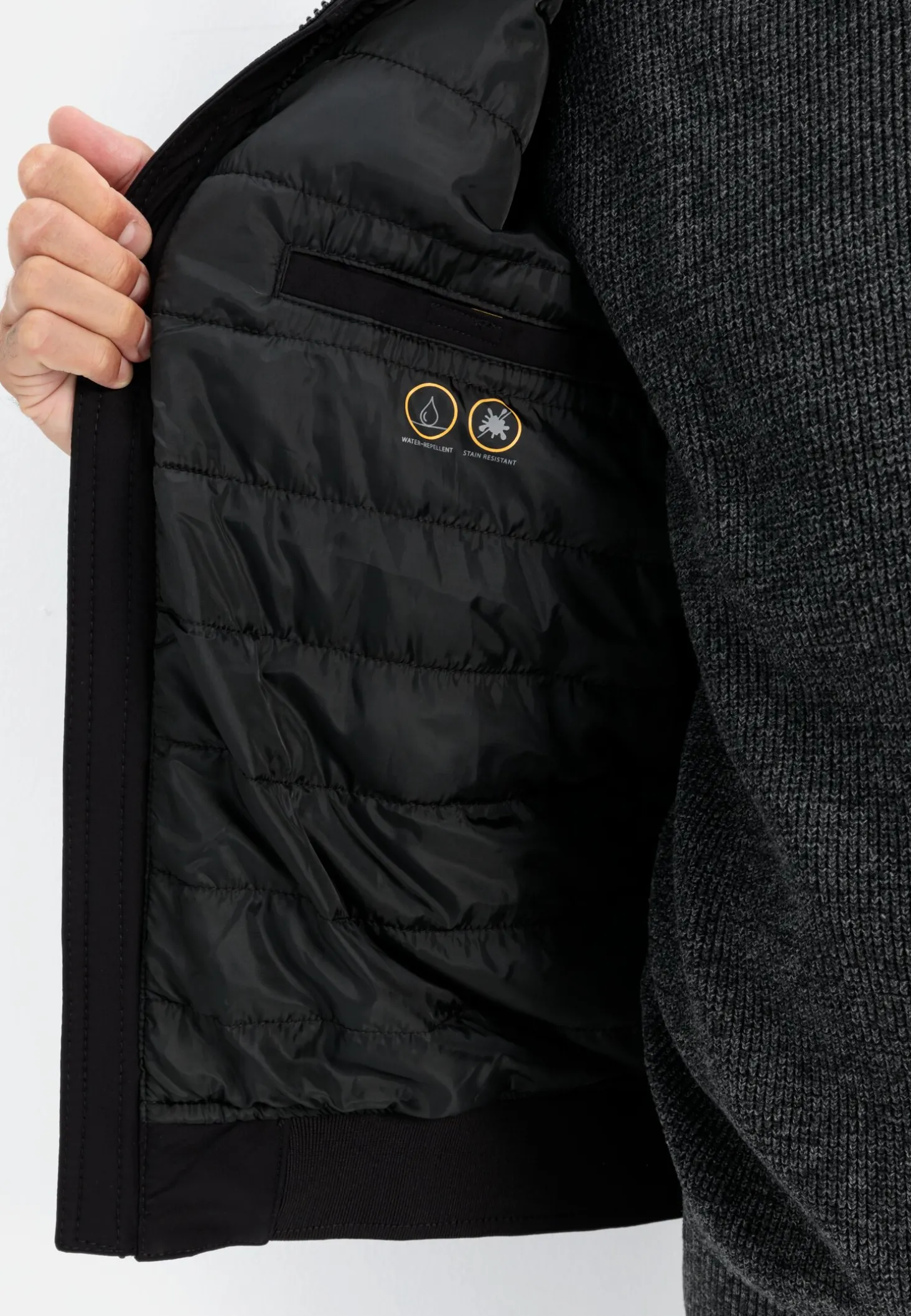 Softshell Blouson mit einrollbarer Kapuze